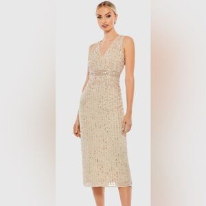 Mac Duggal sleeveless sequin dress Dress is tea length and very classy